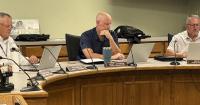 Laughlin returns to commission board