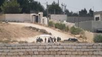 Palestinian families remain trapped in their homes as Israeli settlers besiege the town of Qusra