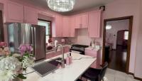 'Unique' all-pink house goes up for sale in Bay View