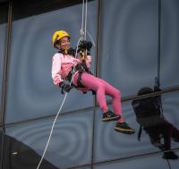 Fundraising rappel from top of downtown tower with persuasive granddaughter leaves 72-year-old exhilarated