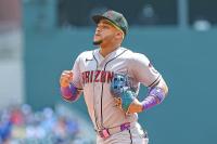 Diamondbacks' Marte travels to Phoenix for MRI on knee