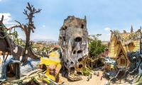 Would YOU stay here? The world's ugliest hotels - from bizarre pyramids to a bright yellow eyesore and Britain's 'worst'