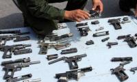 Laos tightens control over illegal weapons