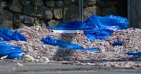 Two tons of squid spill out onto Rhode Island roadway