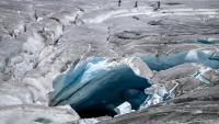 Bodies discovered as climate change leads to low water levels, melting glaciers