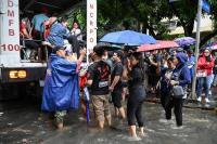 Bad weather? DOLE reminds private employers on work suspension, pay