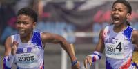 Twins help Baton Rouge track team break national 4x100 record
