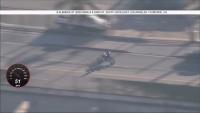 Dirt bike rider in custody after hiding in recycling bin during LAPD chase