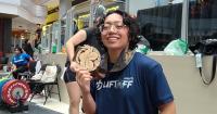 In a year filled with lows and highs, weightlifter Chloe Santos returns home with gold and inspiration
