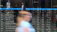 Shares break losing streak but banking slump continues