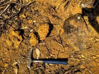 Iron-rich weathered Earth and rock fragments