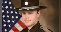 Iowa Trooper Wounded by Shotgun-Wielding Suspect Accused of Killing Woman