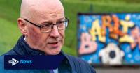 Swinney defends £45,000 business class flights to World Cup
