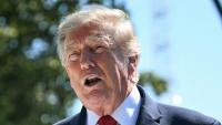 Trump says U.S. is waging economic warfare against Iran