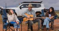 Musician trades 'dream home' for van life in red dirt