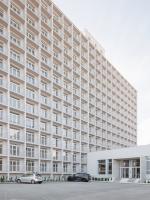 atrium architekti transforms 1960s workers’ dormitory into 507 homes in slovakia