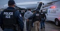 The U.S. deports the first 20 immigrants to Liberia under an agreement to accept 1,200 migrants