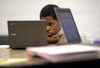 DC-area schools look to balance screens and traditional learning