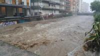 Shock moment roads turn to rivers as tourist towns in Italy & Spain battered by flash floods & Europe braces for storms