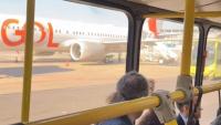 Bus 'crashes into plane' at major airport as man says 'the wing is on top of the bus'