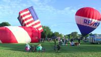 Balloons stay grounded for the first launch window of the Lewiston-Auburn Balloon Festival
