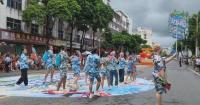 Water-splashing festival in Hainan attracts int'l tourists