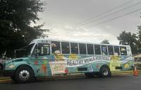 In time for school year, food bank’s new bus starts serving hot meals to Fairfax children