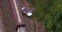 Driver seriously hurt after freight train hits car in Lake Forest