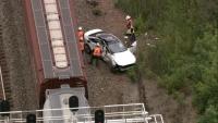 Freight train hits car in Lake Forest, man seriously injured: police
