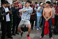 Aura' battles move from social media to the streets