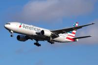 Plane passenger treated for burn injuries after laptop catches fire during American Airlines flight
