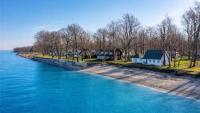 Fisher Price Co-Founder’s Lakefront Summer Cottage Where He Would Test New Toys Is Listed for Under $400K