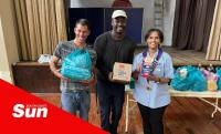 Kingsburgh Lions hands over grocery donation to Mother of Peace