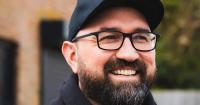 Business owner saving thousands by working in converted garage