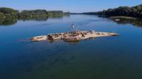 Ship built in 1913 emerged from the dried-up Sava River