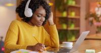 People who listen to music while working might be making their brain work harder than those who don't, says behaviour science
