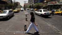 Iranian women defy efforts by hardliners to enforce wearing of hijab
