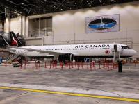 Canadian airlines scramble to make economy class less wearying