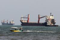 Iranian Cargo Ship Struck in Strait of Hormuz; Houthis Attack Saudi Arabia