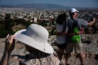 Sunhats Are Everywhere in Athens as Growing Tourist Crowds Seek Relief From the Scorching Heat at Ancient Sites