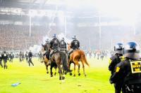 Fans, police injured as pitch invasion mars 2026 German Cup clash
