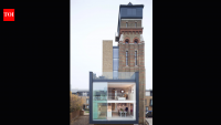 A British couple bought a derelict 85-foot, seven-storey Victorian water tower at auction
