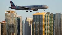 American Airlines flight lands safely after laptop battery catches fire on board; passenger injured