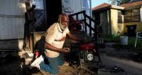 Frustration builds in Indiana town struggling without power for 12 days