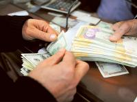 Iran currency plunges to record $1:2 million rials