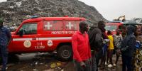 At least 30 killed after landslide tears through rubbish landfill in Guinea