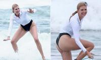 Ivanka Trump bares all in skimpy black bathing suit as she goes surfing in Costa Rica