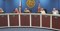 A school board’s partisan pendulum swings, and multitasking food trucks