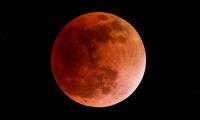 Blood-red moon over US sparks Armageddon fears as biblical prophecy appears to unfold