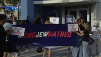 Crowds rally in support of Jewish community in Surfside after man allegedly punched tourist in antisemitic attack